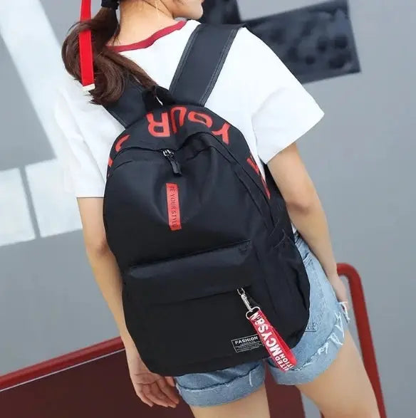 Fashion trend backpack by Simples Market; black large-capacity backpack with red accents for men and women