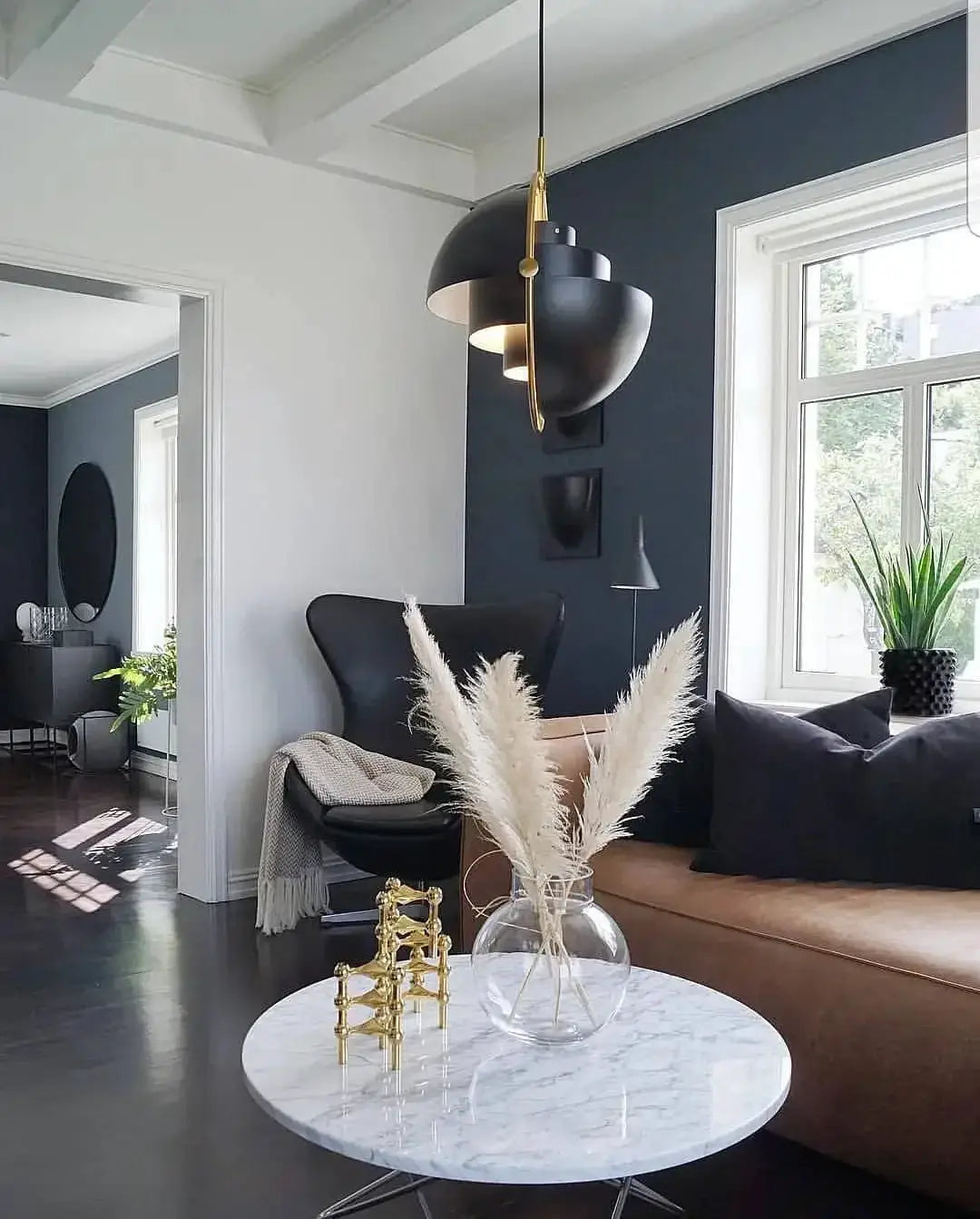 LED pendant light for kitchen island with black iron spheres and gold accents