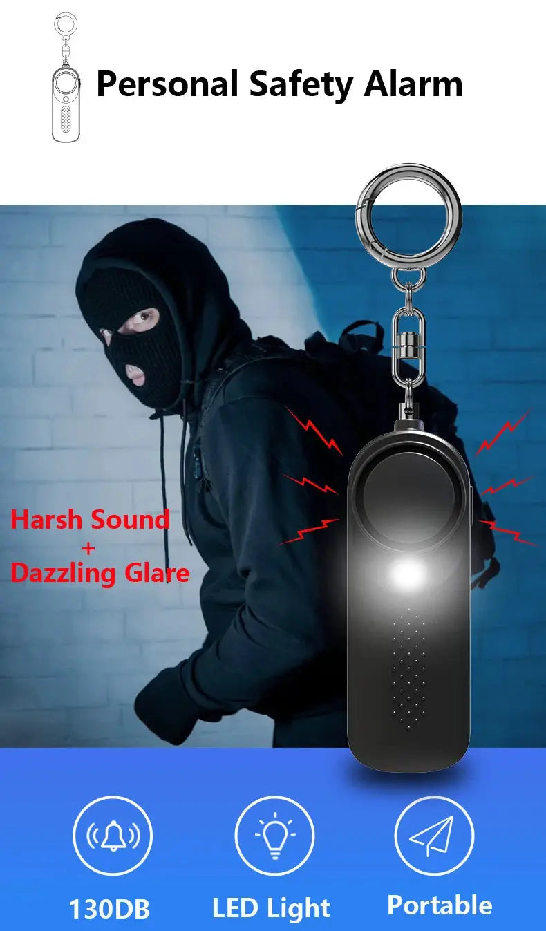 Personal safety alarm keychain by Simples Market, black portable 130dB siren with LED light