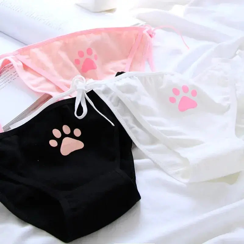 3-pack women's cotton panties with paw-print design in pink, white, and black
