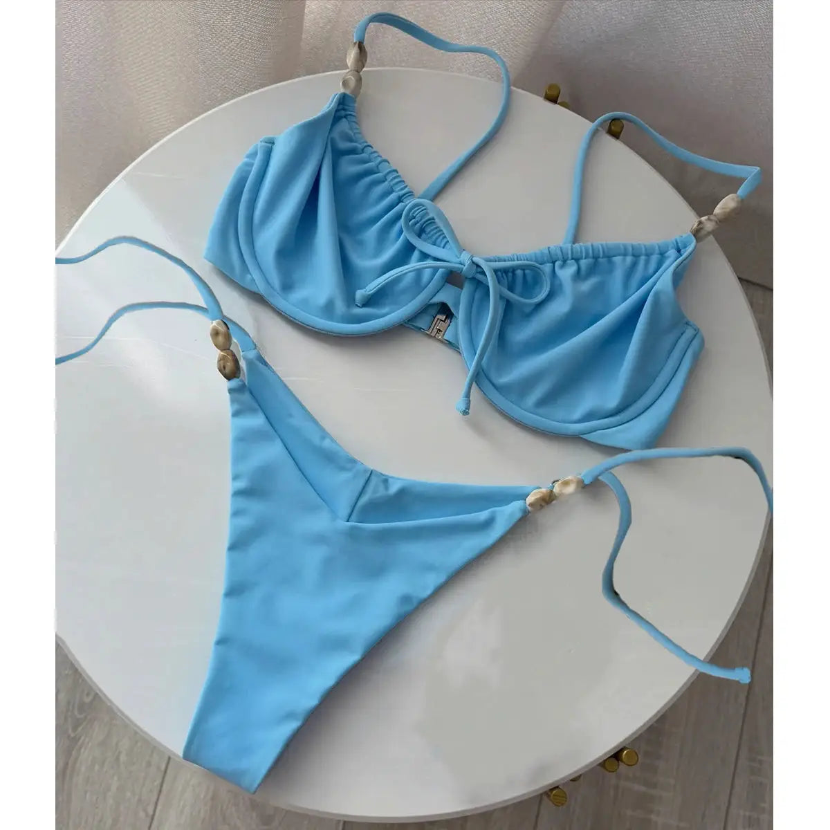 Push Up Bikini Set in light blue with beaded strap accents, top with ties and matching bottoms - Simples Market