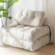 Folding sofa bed by Simples Market in cream corduroy with tufted cushions