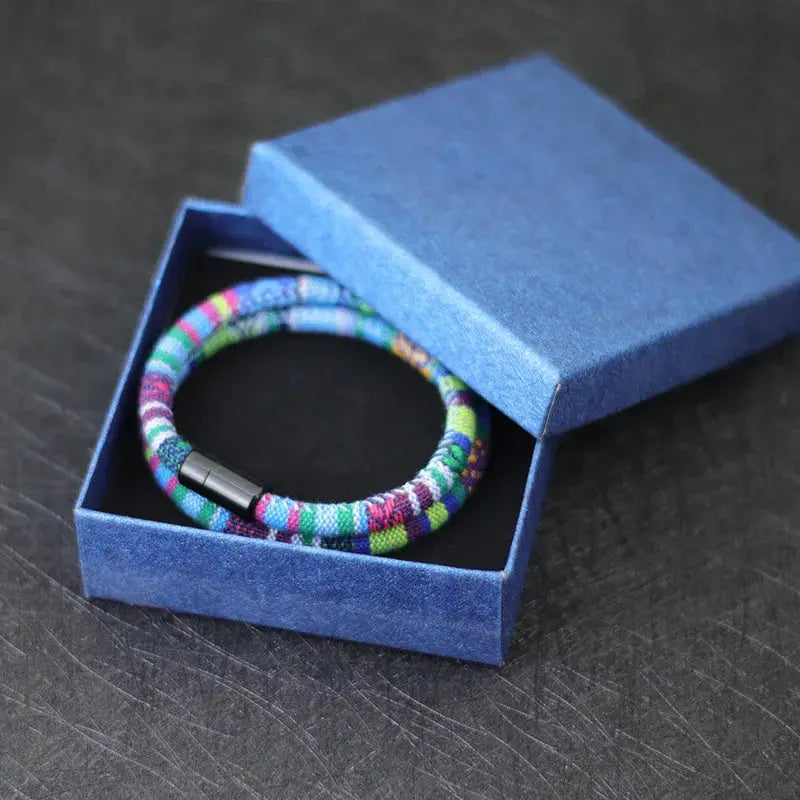 Men's bohemian rope bracelet with magnetic clasp in multicolor weave, Simples Market in blue box