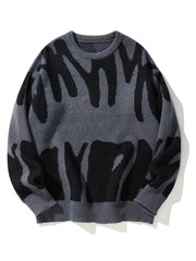 Men's pullover sweater with irregular jacquard pattern in charcoal and black, knitted crew neck.
