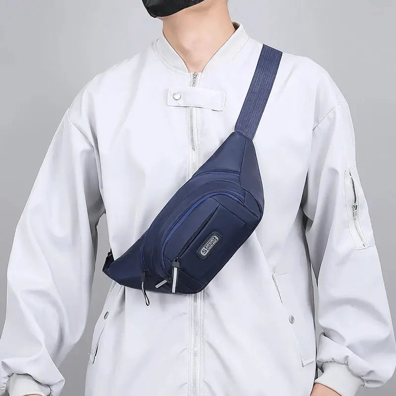 Simples Market navy blue men's waist bag worn crossbody; ultra-thin, large-capacity with multiple zip pockets.