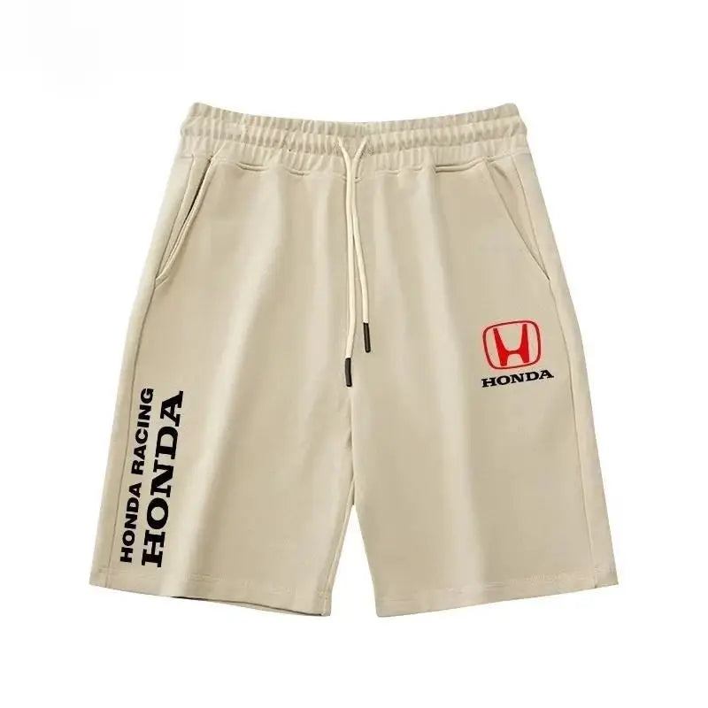 Honda cycling shorts in beige by Simples Market with red Honda logo on right leg