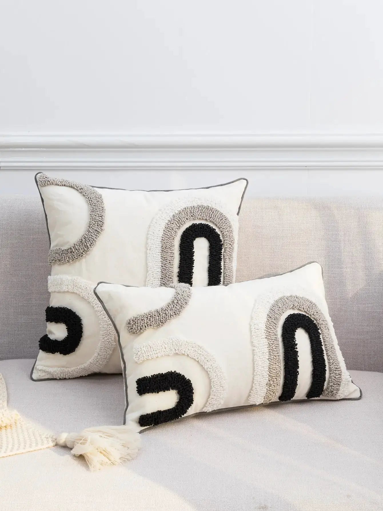 Two white boho pillow covers with black and gray U-shaped loop patterns, Simples Market