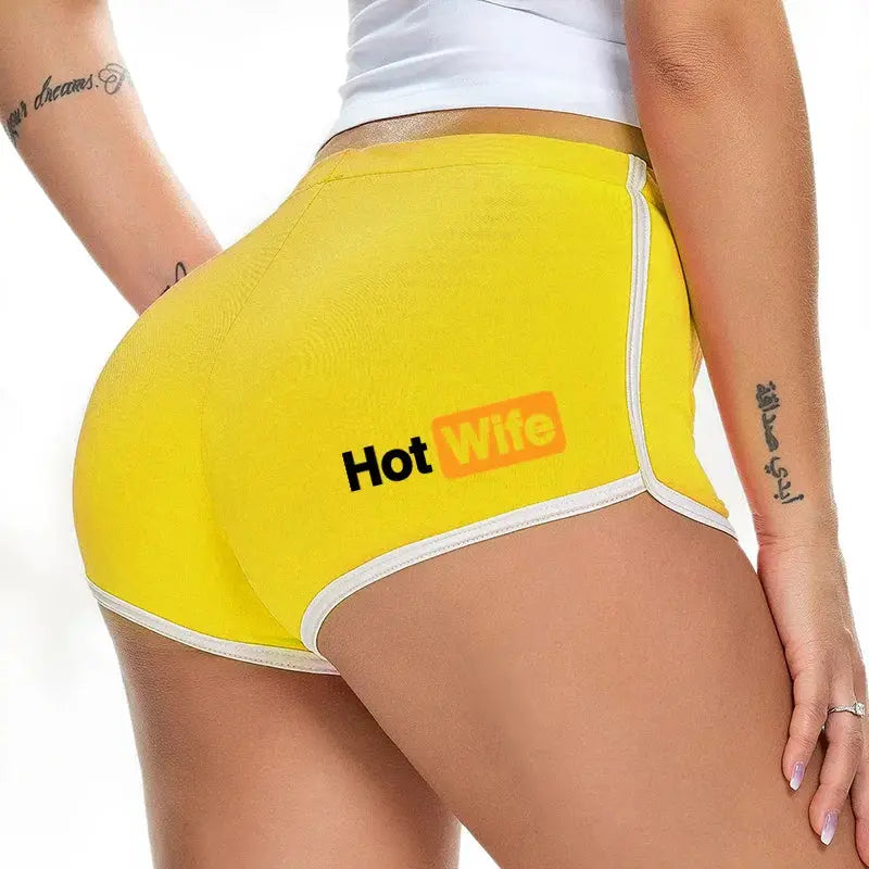 Yellow women's shorts with white trim and Hot Wife logo