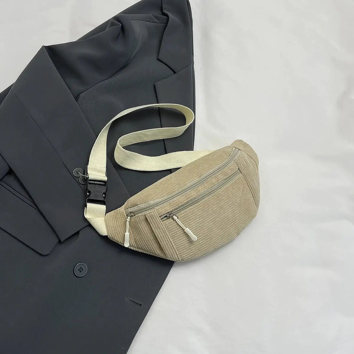 Corduroy waist bag for women with beige body and cream strap, dual zipper pockets