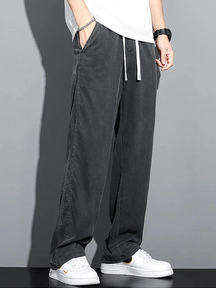Men's loose straight pants with drawstring elastic waist in gray lyocell fabric by Simples Market