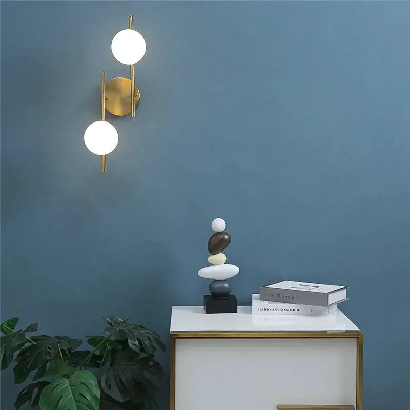 Modern gold LED wall lamps with milky glass round globes, dual bulbs, indoor wall sconce