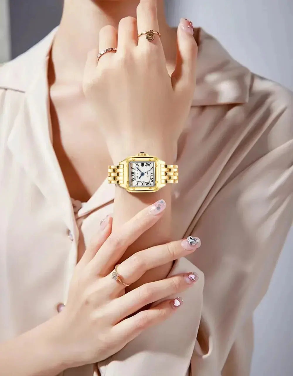 Gold-tone square women's wristwatch with rhinestone bezel and linked bracelet