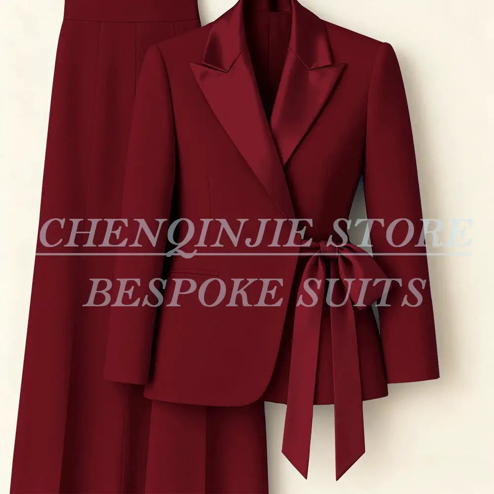 Simples Market burgundy belted 2-piece women's suit set with peak-lapel blazer and matching pants.