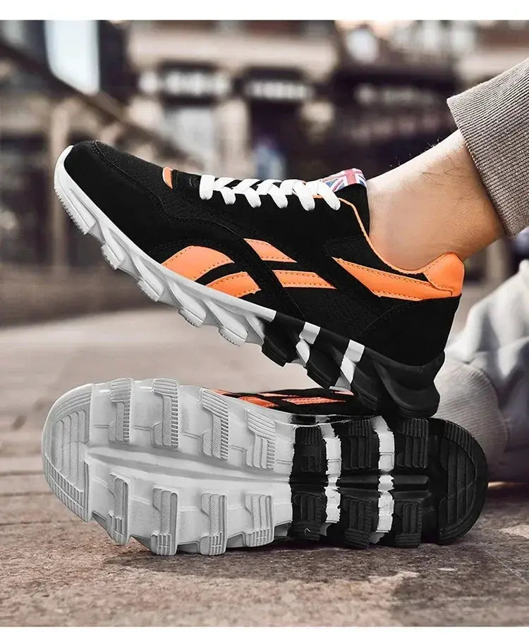 Brand Trend men's fitness sneakers pair with black/orange upper, white laces, thick cushioned sole and rugged outsole