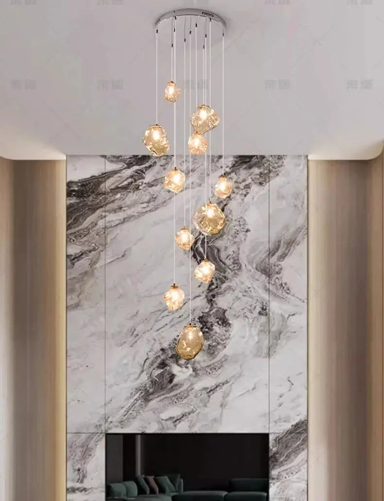 Pendant light fixture with cascading amber glass orbs, modern LED chandelier for living room