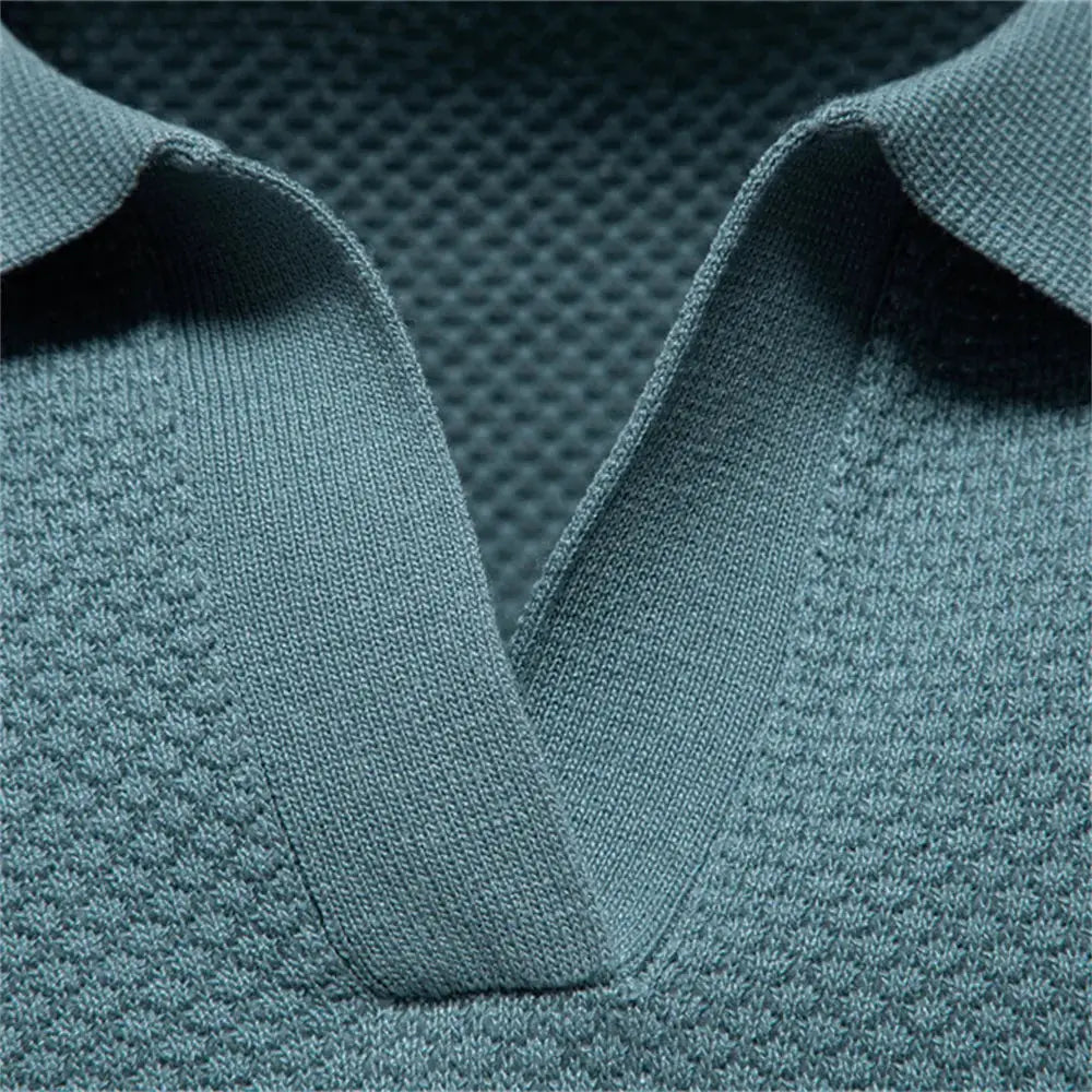 Men's golf polo shirt by Simples Market in teal blue with breathable knit fabric and collar.