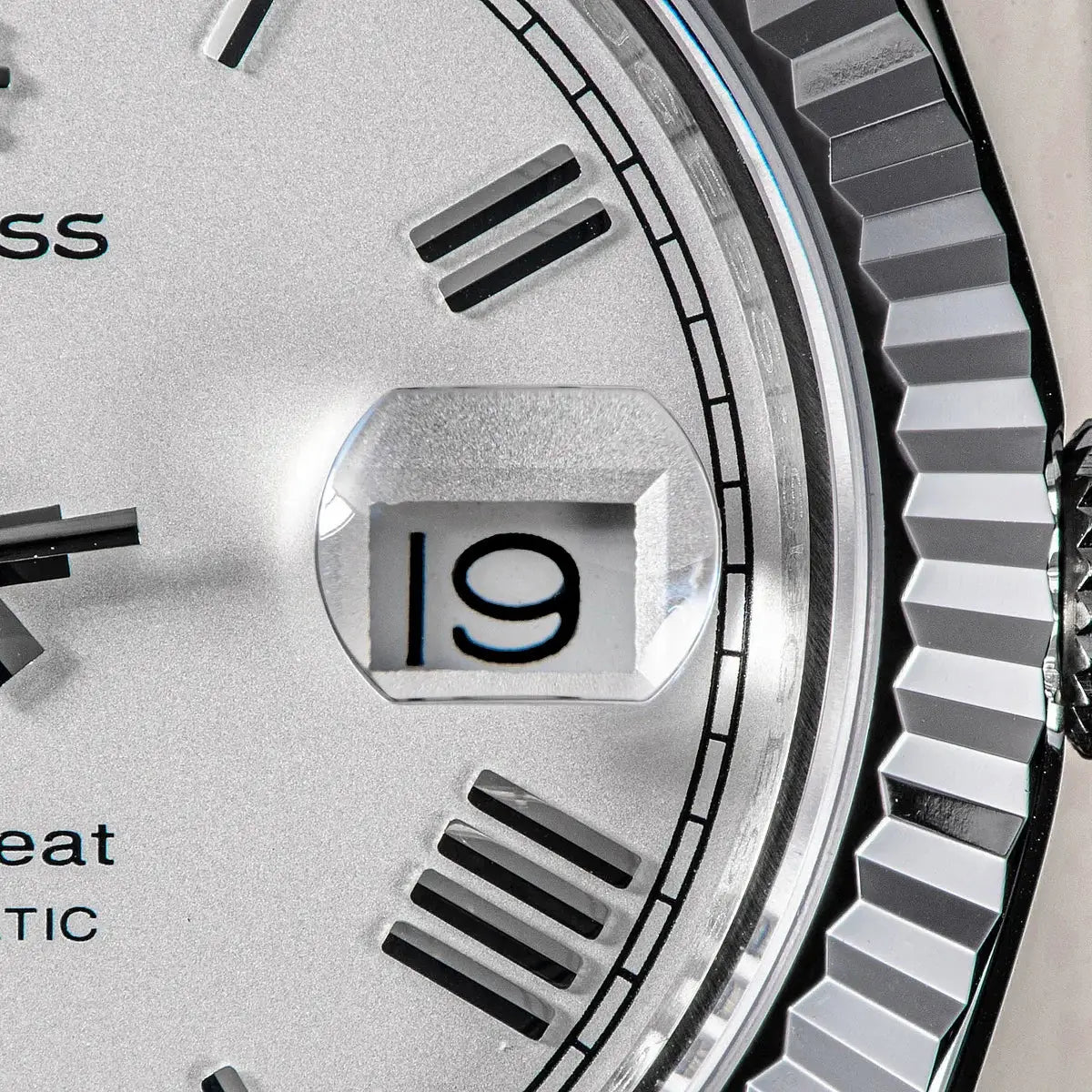 Sugess men's 40mm wristwatch with silver dial, date window magnifier, stainless steel case