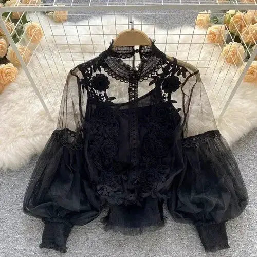 Lace puff long-sleeve blouse in black with sheer mesh sleeves and high-neck lace