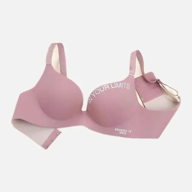 Pink Simplicity letters-printed bralette with seamless cups, wire-free design, and fully adjustable straps