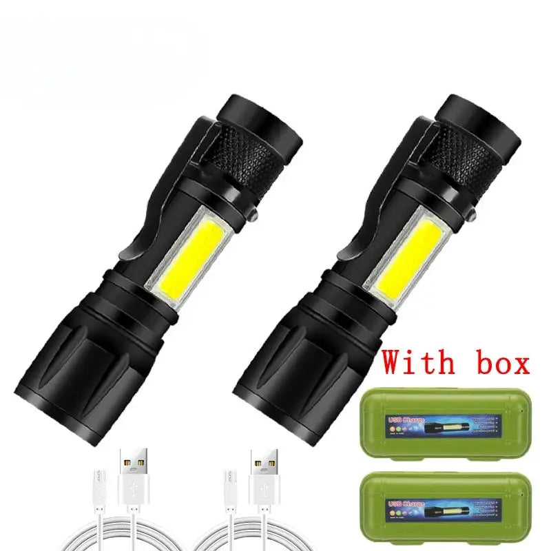 Rechargeable LED flashlight two-pack in black with zoomable head, includes USB cables and green storage cases.