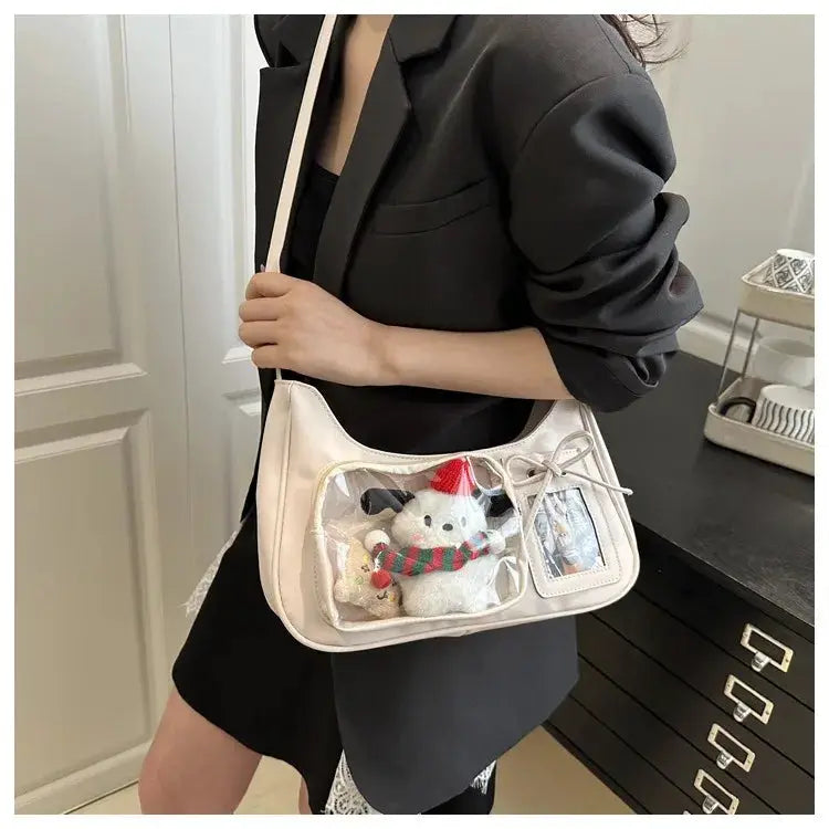 Y2k Harajuku shoulder bag cream with clear front panel showing plush toys and a photo tag, crossbody