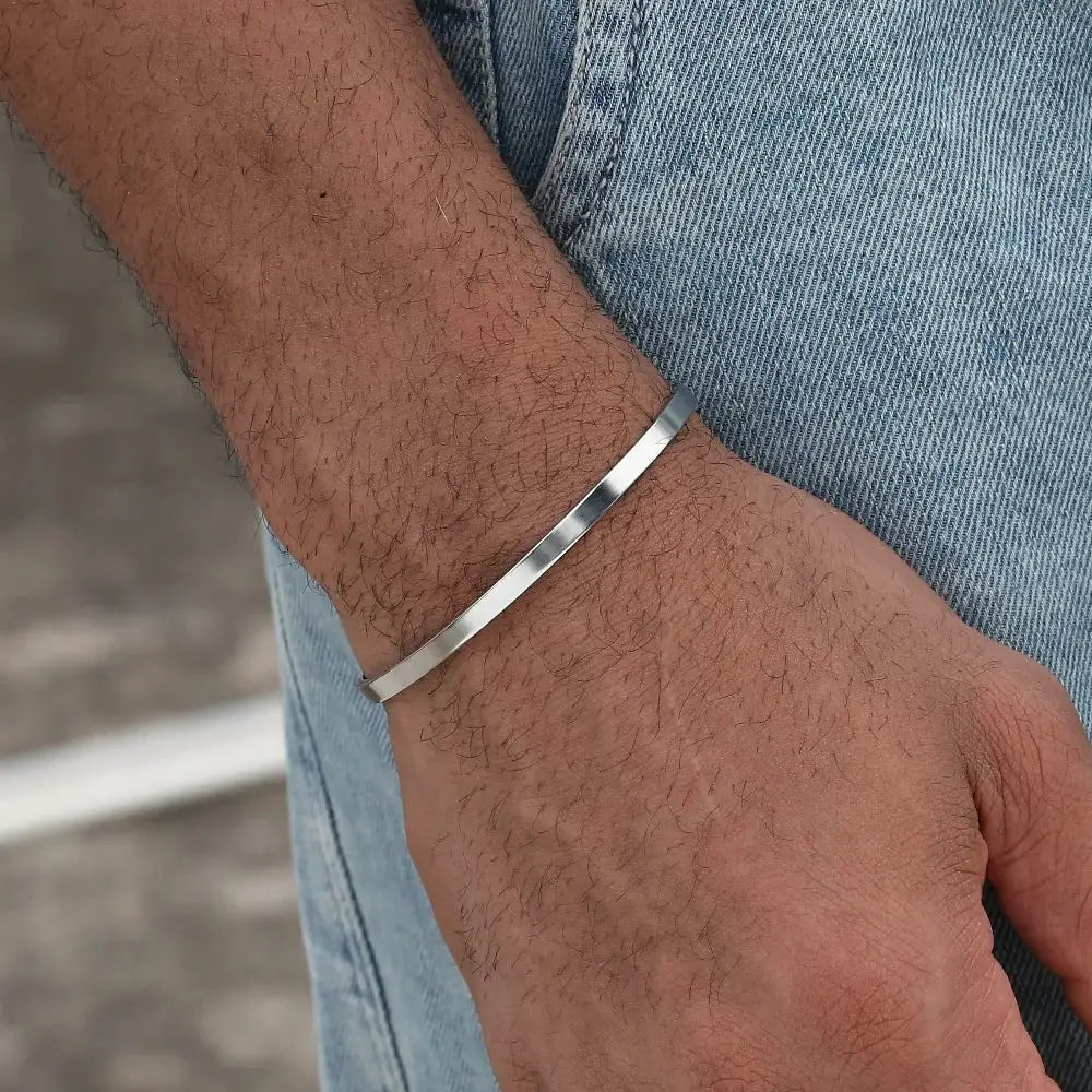 3mm stainless steel Cuban chain bracelet for men, silver slim flat band on the wrist.