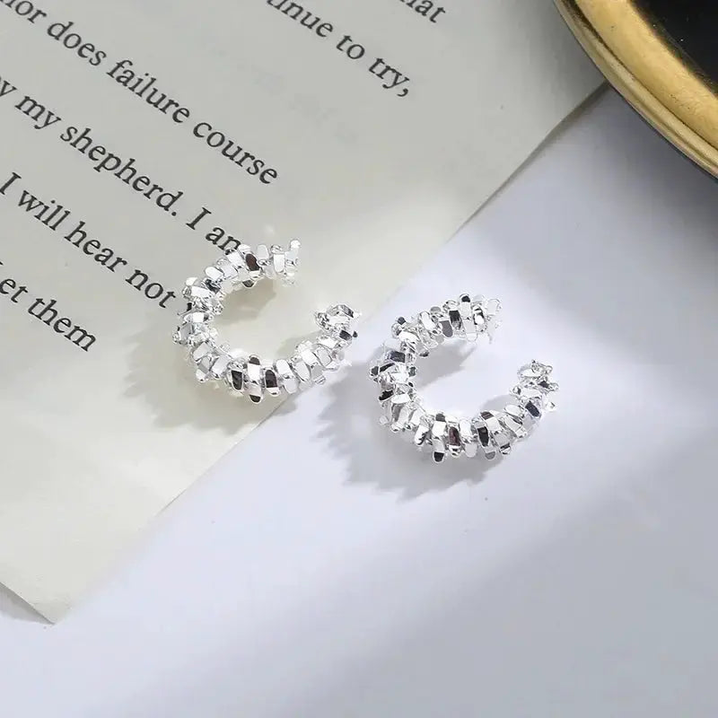 Simples Market irregular star clip earrings, silver-tone pair, no-piercing ear cuffs for women