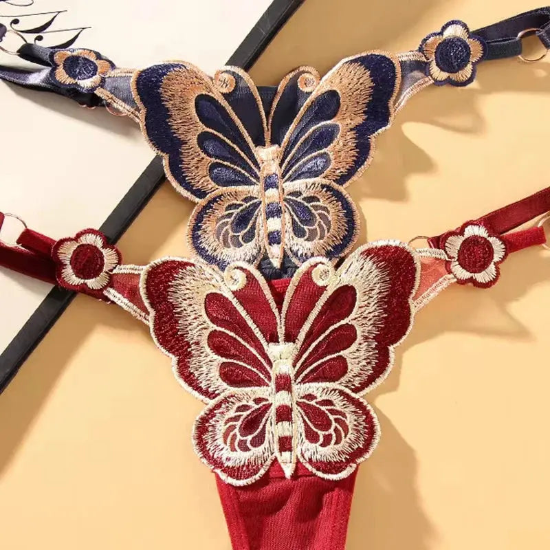 Two-piece butterfly lace thong set in navy blue and red with embroidered butterfly motifs, low-waist G-string