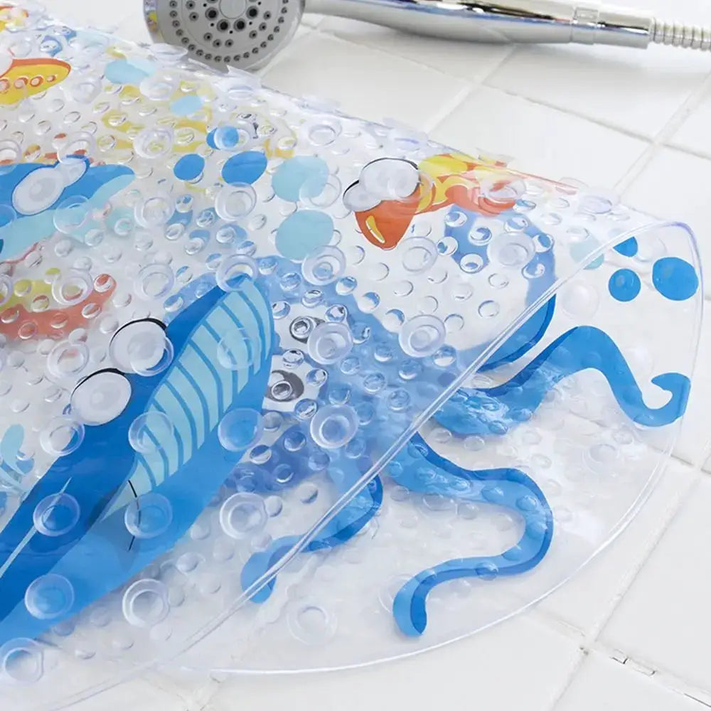 Soft cartoon PVC kids bath mat with anti-slip suction cups; clear mat featuring blue sea-creature print