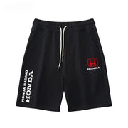 Black Honda-branded cycling shorts with white drawstring, Honda logo and vertical Honda Racing text on left leg.