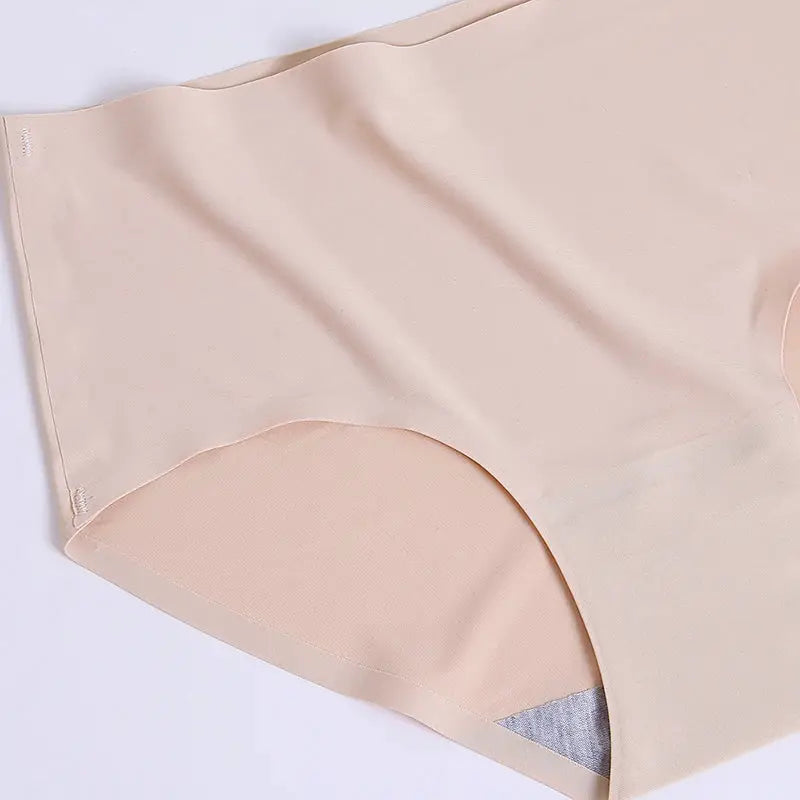Women's seamless nude beige briefs with smooth, soft fabric