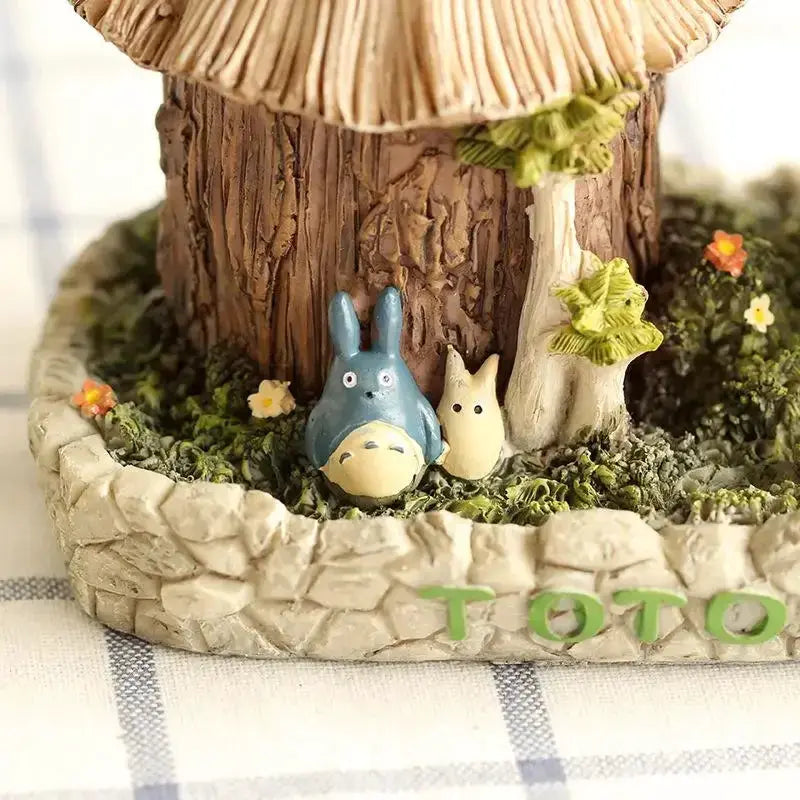 Totoro LED desk lamp figurine with bulbs; two blue and white Totoro figures on a rocky garden base