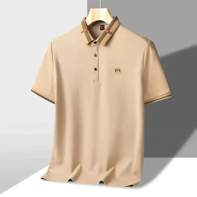 Simples Market beige polo shirt with embroidered logo, plaid collar trim, short sleeves.