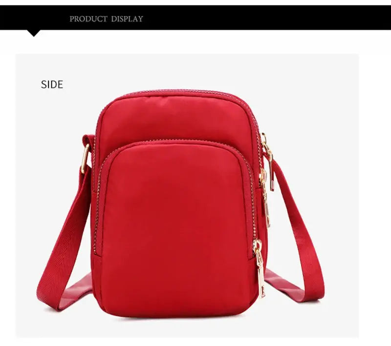 Women's crossbody bag, red waterproof with multiple zip pockets and adjustable strap