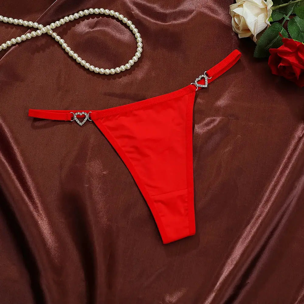 Simples Market red cotton thong, low-rise G-string with heart-shaped rhinestone decorations