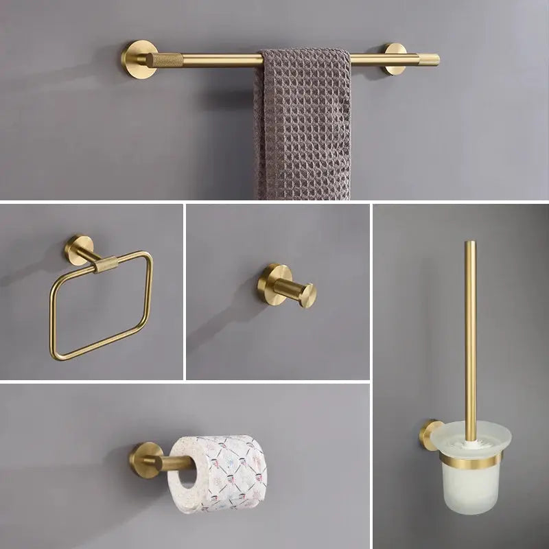 Brushed gold bathroom hardware set with towel bar, towel ring, robe hook, toilet paper holder, and toilet brush