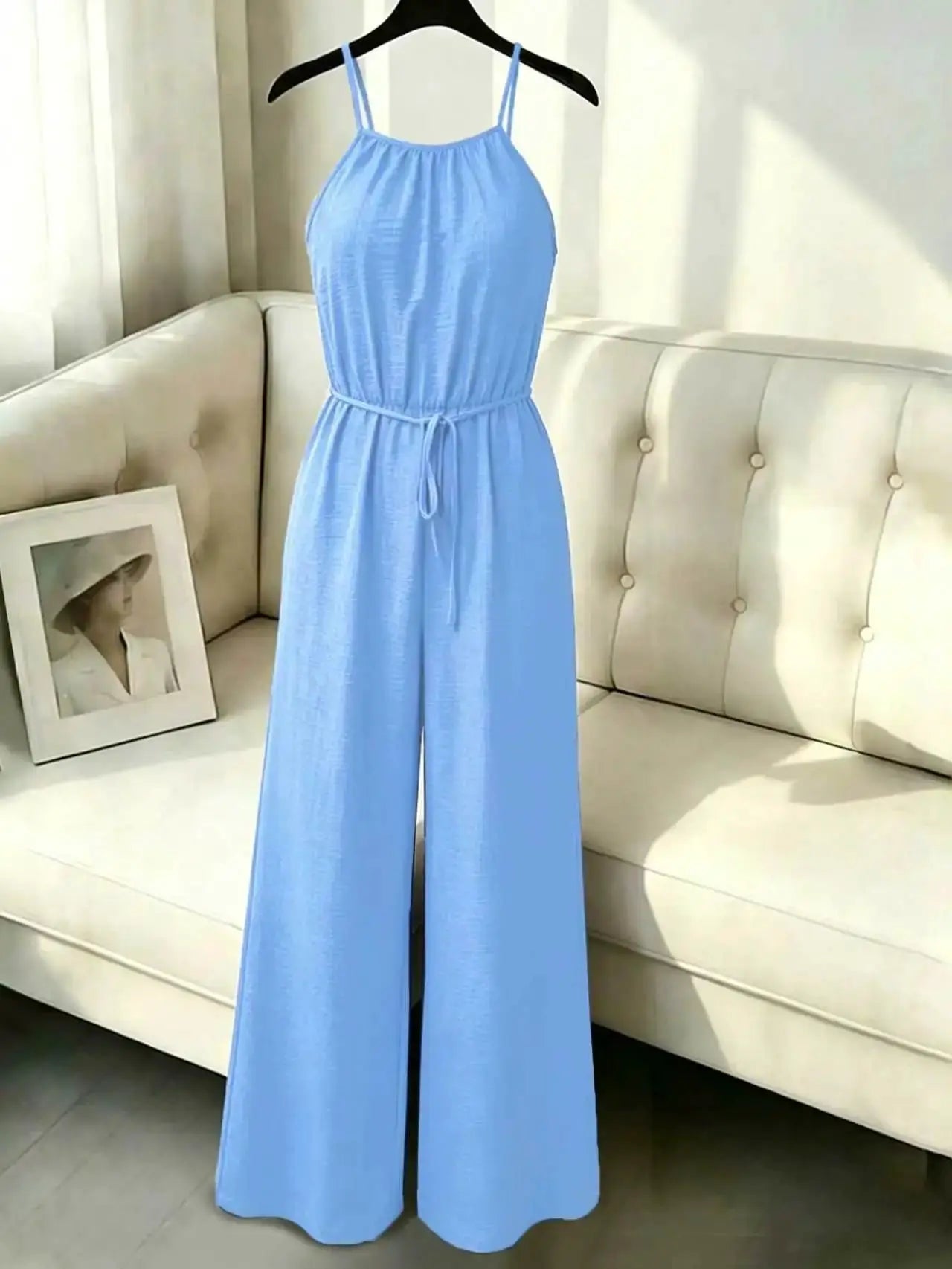 Simples Market women's sleeveless jumpsuit with suspenders in light blue, wide-leg with tie-waist