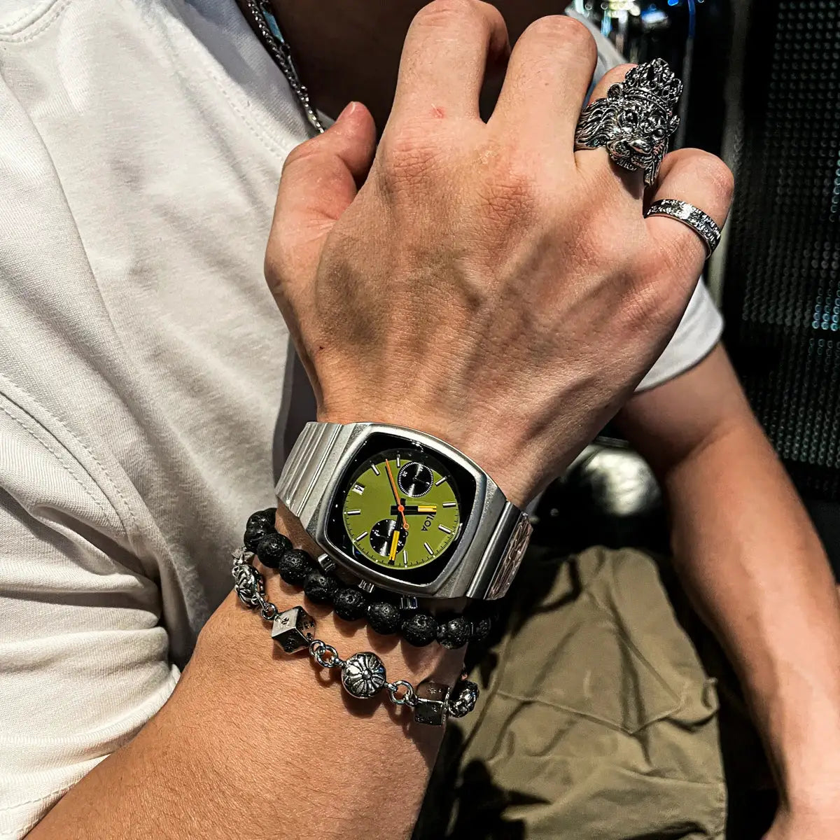 Men's stainless steel quartz chronograph watch with lime-green dial on metal bracelet