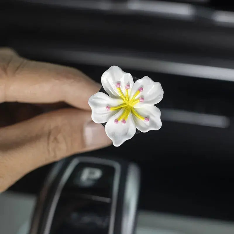 2-pack car perfume clip flower air vent decorations; white petals with yellow center