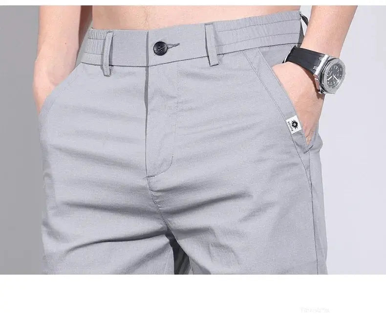 Men's casual pants in gray ice silk cotton by Simples Market with belt loops and front pockets.
