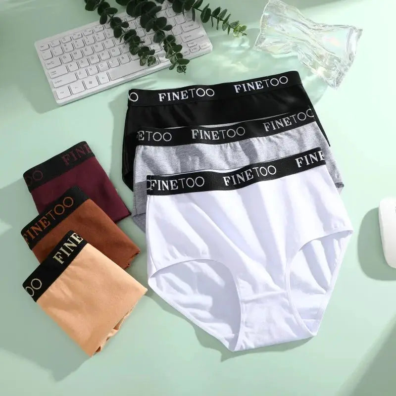Finetoo 3-pack women's cotton briefs; seamless, low-rise breathable underwear in white, gray, and black