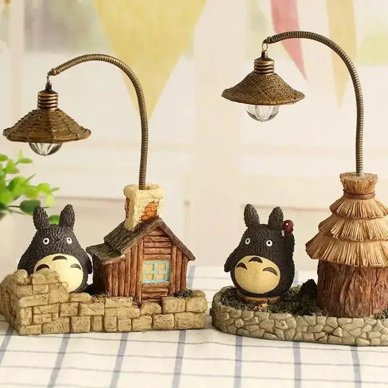 Totoro LED desk lamp set with two gooseneck lamps, brown wicker shades, and Totoro figures beside a cottage on a base
