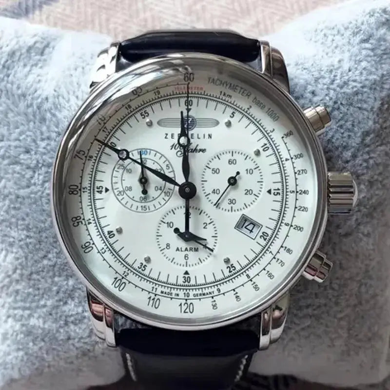 Zeppelin men's automatic chronograph watch with white dial, silver case, black leather strap and tachymeter