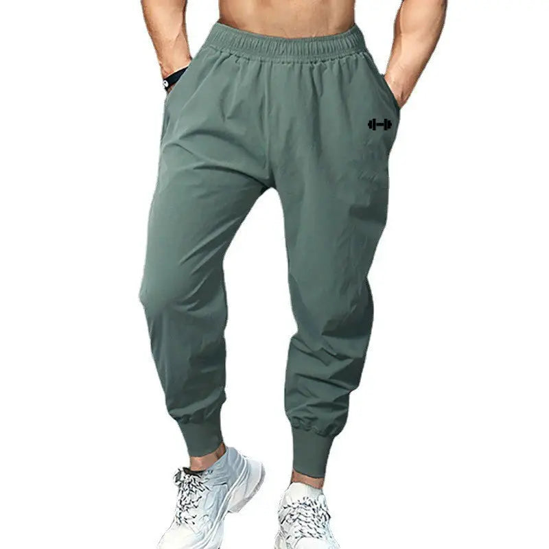 Men's olive-green ultra-thin quick-dry gym jogger pants with elastic waist and cuffed ankles