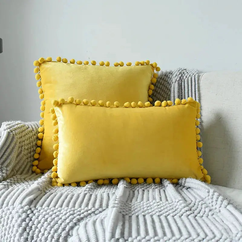 Velvet cushion covers, yellow with pom-pom fringe trim, set of 2