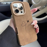 iPhone case in tan faux leather with airplane heart route design