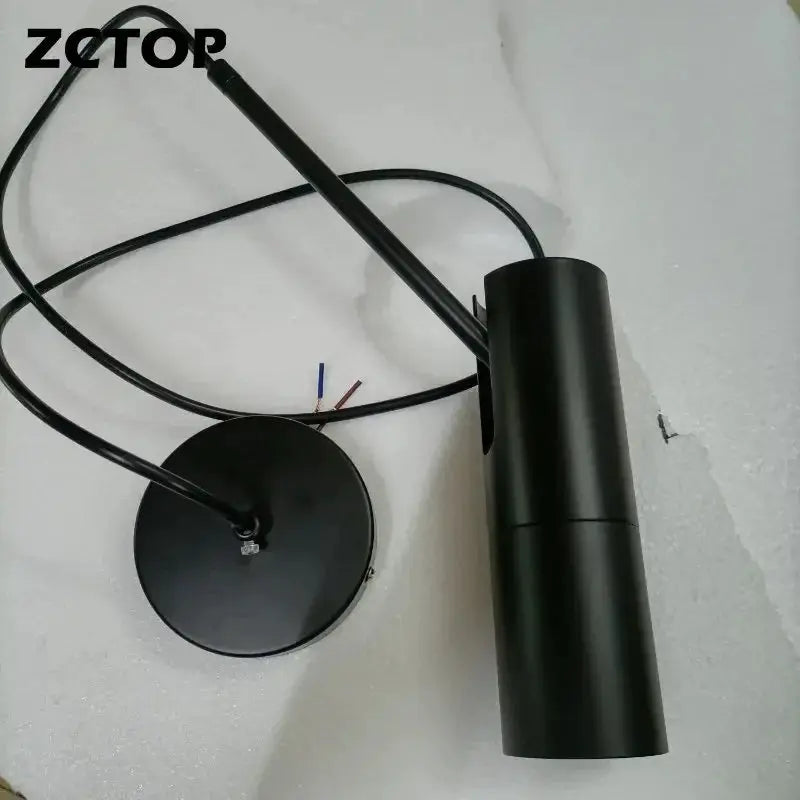 Minimalist black LED hanging pendant light by Simples Market with cylindrical shade and round ceiling mount
