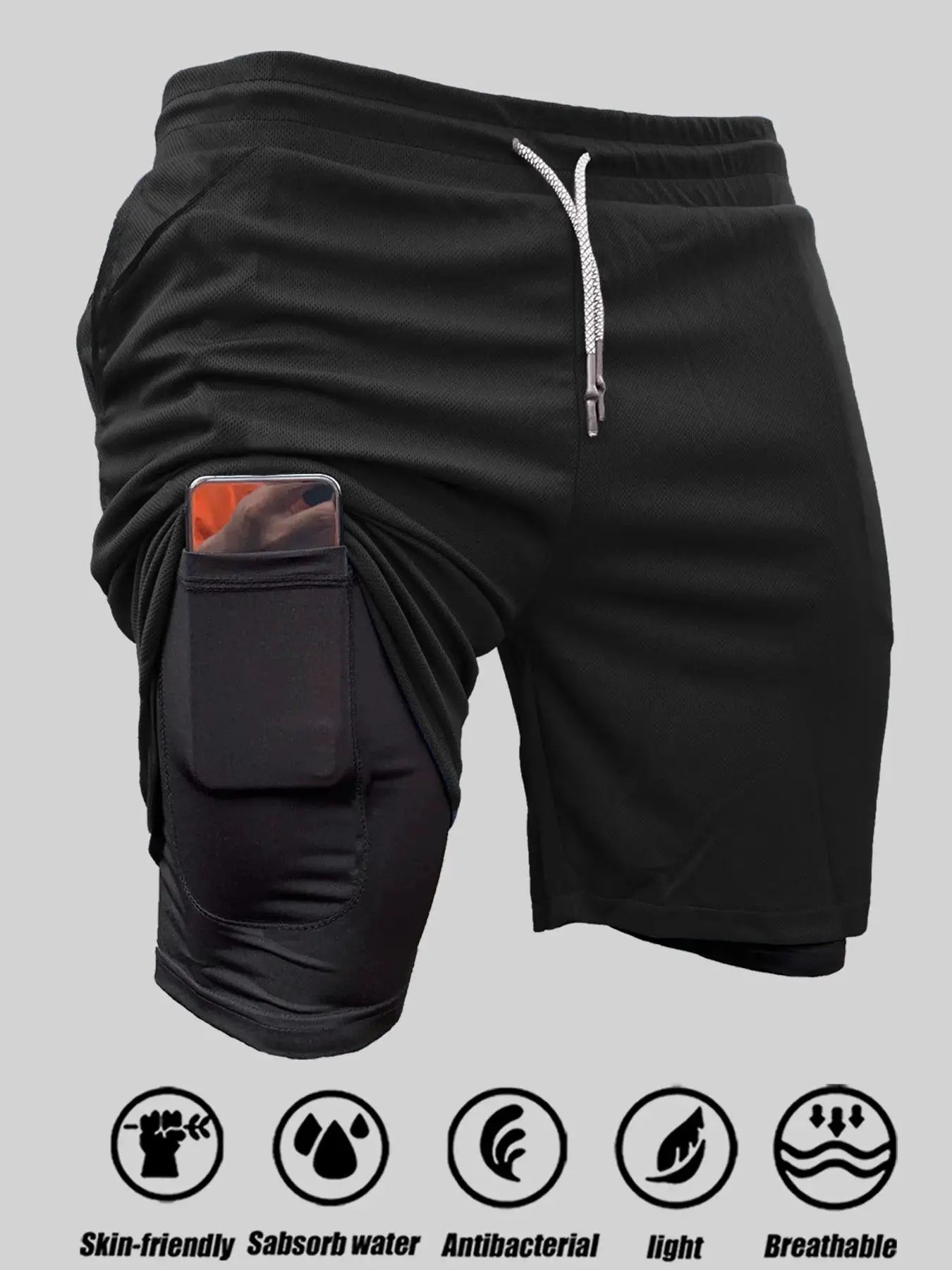 Men's black athletic shorts by Simples Market with zip pocket, drawstring waistband, and phone pocket.