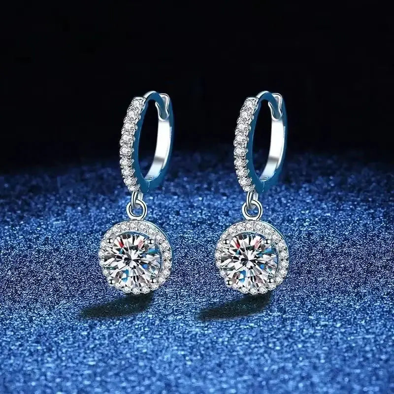 Pair of sterling silver hoop drop earrings with 1 ct moissanite round stones and halo pavé setting