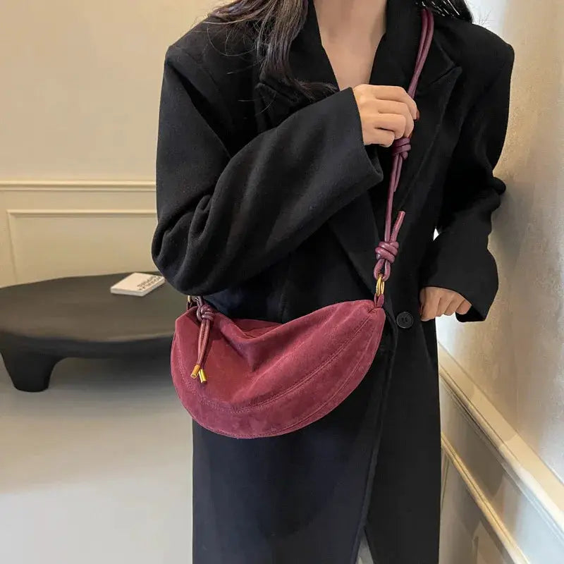 Simples Market faux suede shoulder bag, pink crescent dumpling crossbody with knotted strap.
